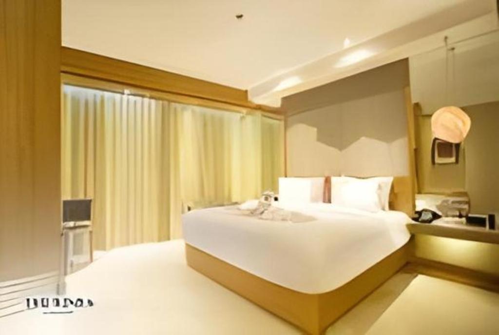 Hotel The Rinra à Makassar Extérieur photo