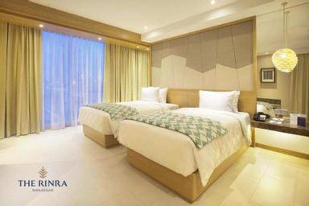Hotel The Rinra à Makassar Extérieur photo