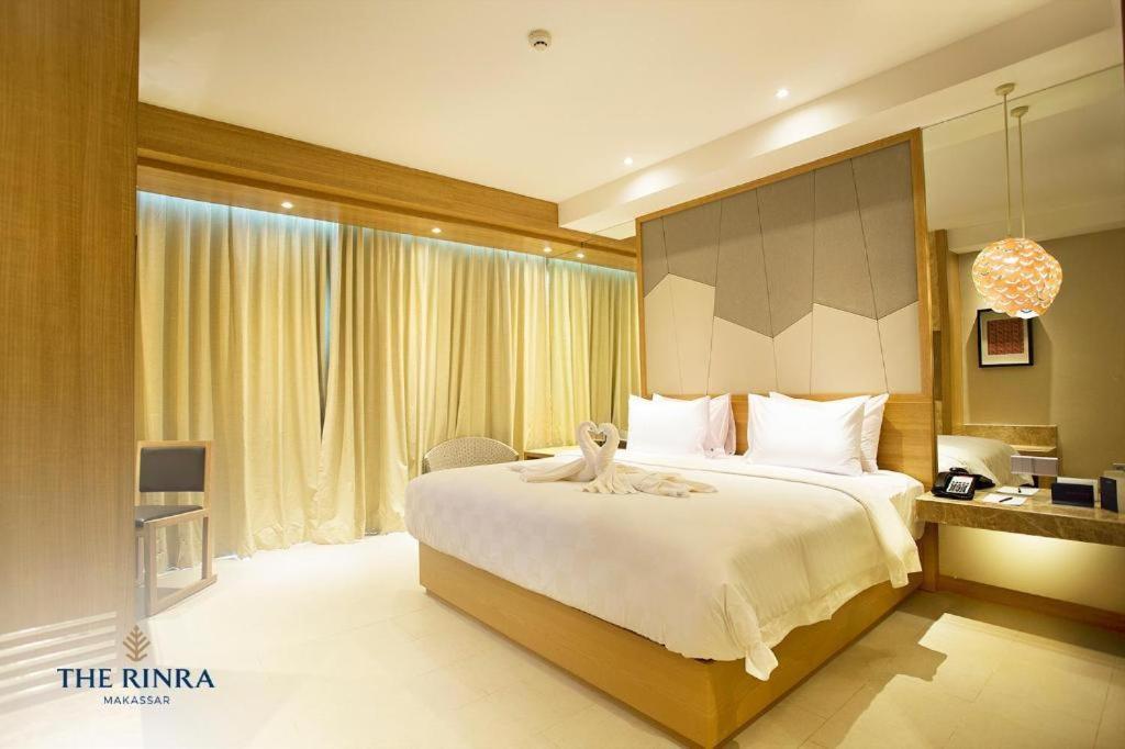 Hotel The Rinra à Makassar Extérieur photo