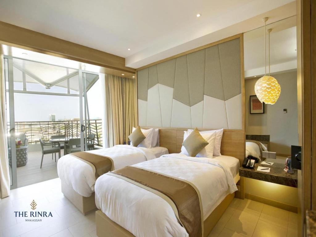 Hotel The Rinra à Makassar Extérieur photo